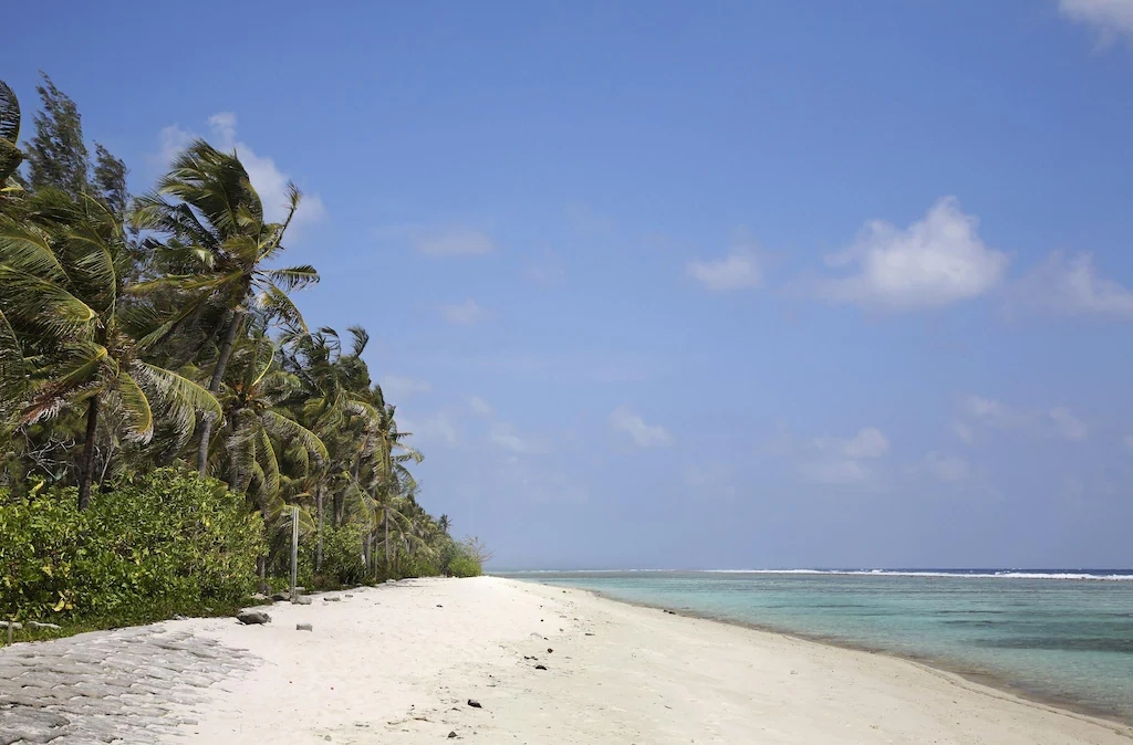 Hulhumalé Beach with palm trees and turquoise water